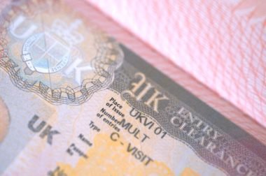 British tourist visa in passport, United Kingdom travel multivisa close-up, travel permit, pass border control, international voyage, UK entry